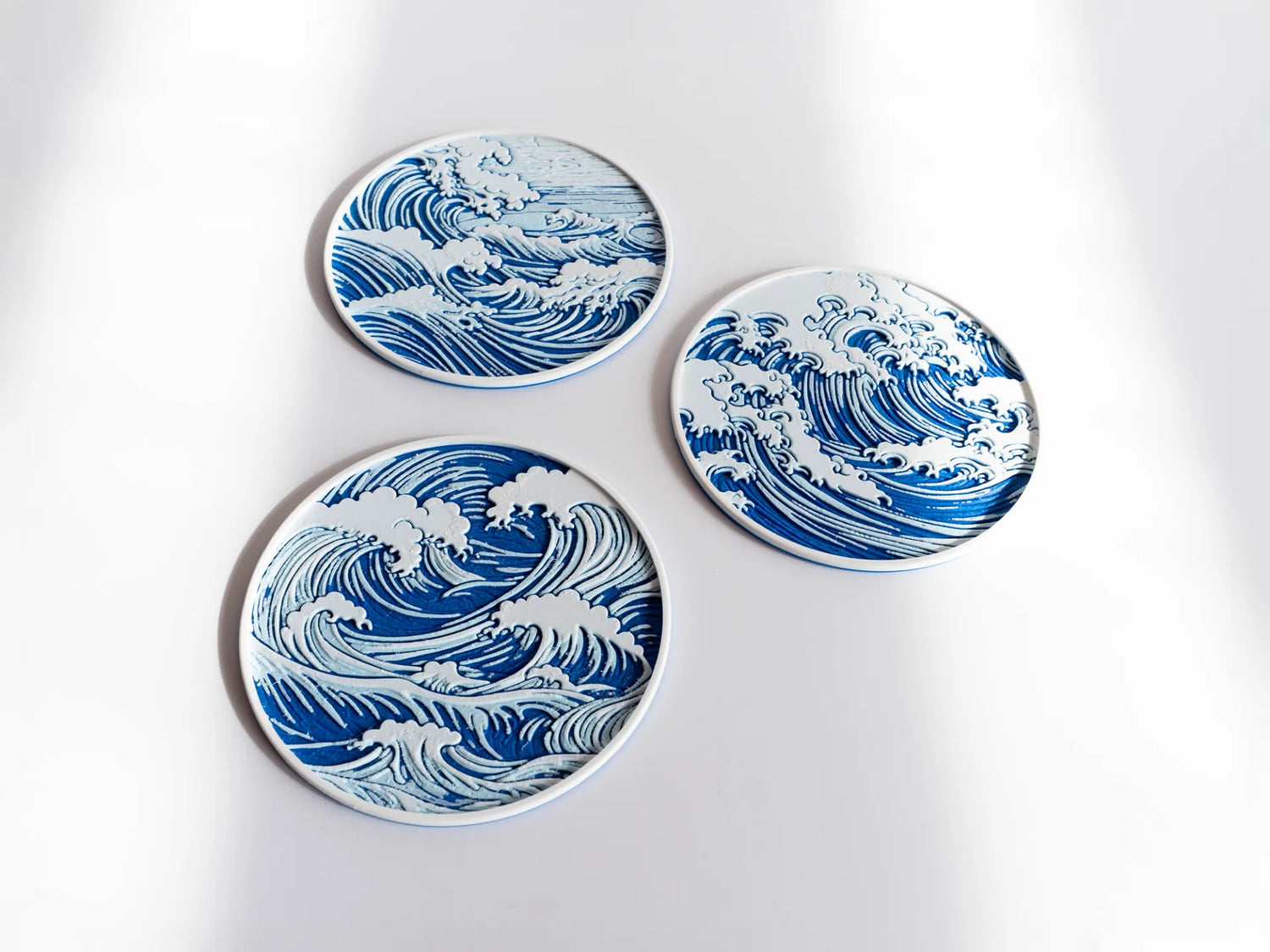 Elegant Blue Ocean Wave Coasters – Art-Inspired Drink Mats